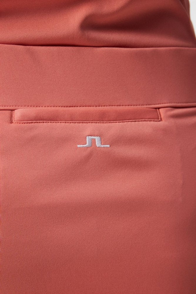 J.Lindeberg Amelie Mid Skirt, Burnt Coral, dámská golfová sukně